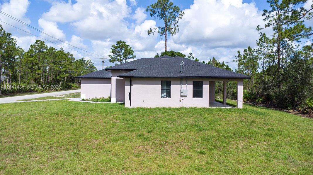 Exterior details and patio area of a home in , Lehigh Acres (Image 25).