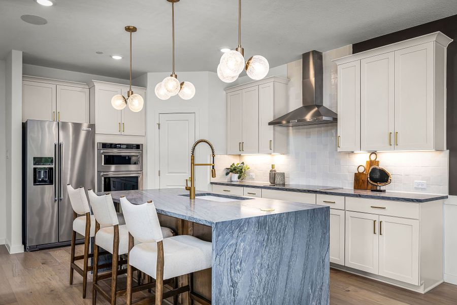 Representative furnished interior of a home built from the Asherton by Pulte Homes in Monarch on Main, Round Rock (Image 21). Representative furnished interior of a home built from the Asherton by Pulte Homes in Monarch on Main, Round Rock (Image 21).