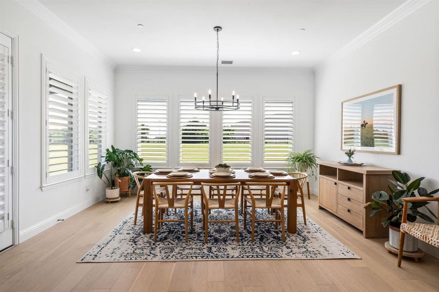 Oversized, sun-drenched breakfast room perfect for casual dining.