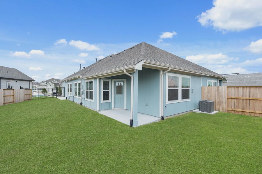 Representative exterior details of a home built from the Chalet by Chesmar Homes in Meridiana Townhomes, Iowa Colony (Image 29).