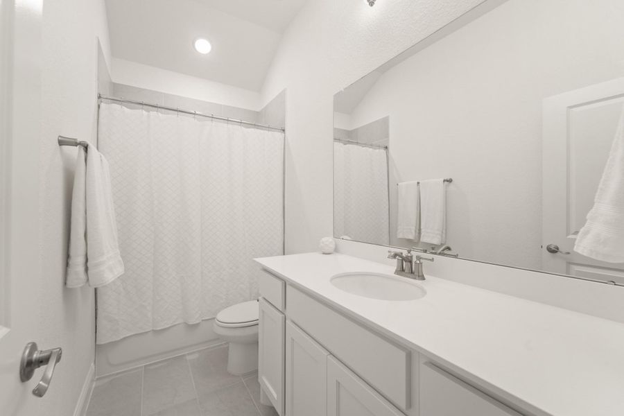 Furnished interior view inside a new home in The Highlands - 65', Porter (Image 12).