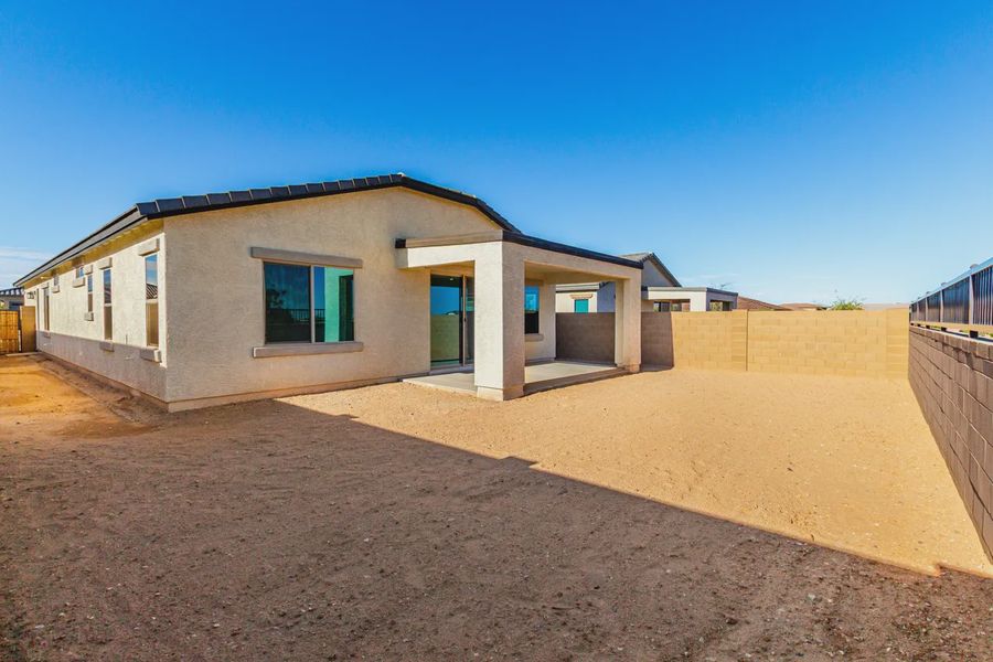 Exterior details and patio area of a home in Avanti at Granite Vista, Waddell (Image 19).