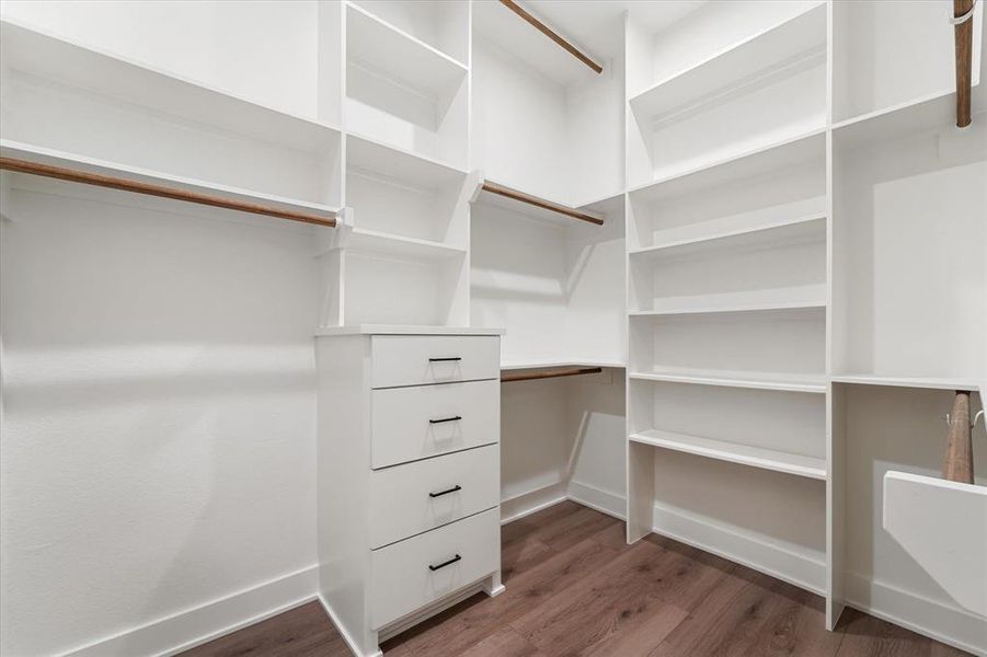 THE CLOSET OF YOUR DREAMS! Built in shelving & drawers and three levels of hanging racks for maximum storage space.