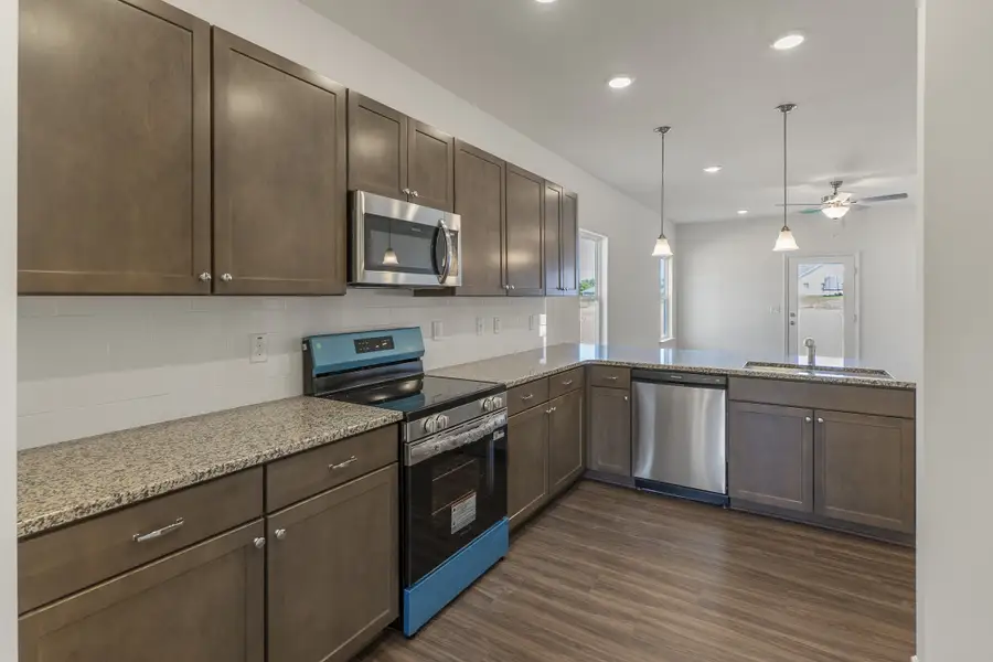 Furnished interior view inside a new home in The Exchange, Vass (Image 4).