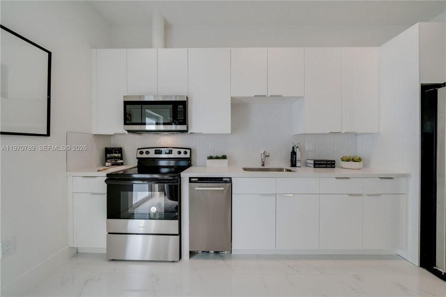 Furnished interior view inside a new home in , Miami (Image 9). Furnished interior view inside a new home in , Miami (Image 9).