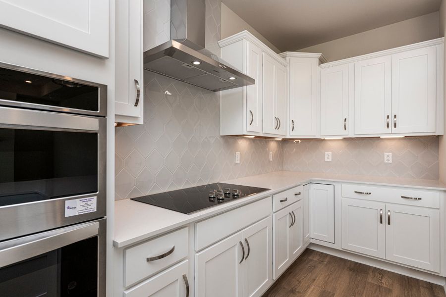 Representative furnished interior of a home built from the Salerno by McKee Homes in The Cottages at 78 North, Sanford (Image 6).
