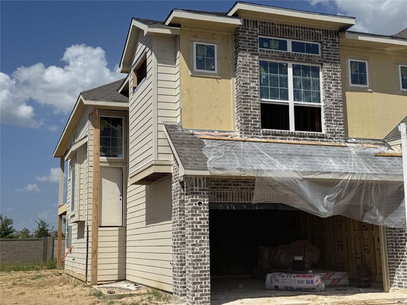 Front exterior of a new home in Bridgeland, Cypress, TX, highlighting curb appeal (Image 20). Front exterior of a new home in Bridgeland, Cypress, TX, highlighting curb appeal (Image 20).