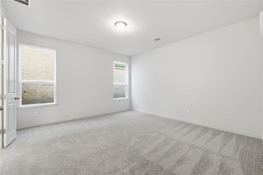Empty room with carpet flooring
