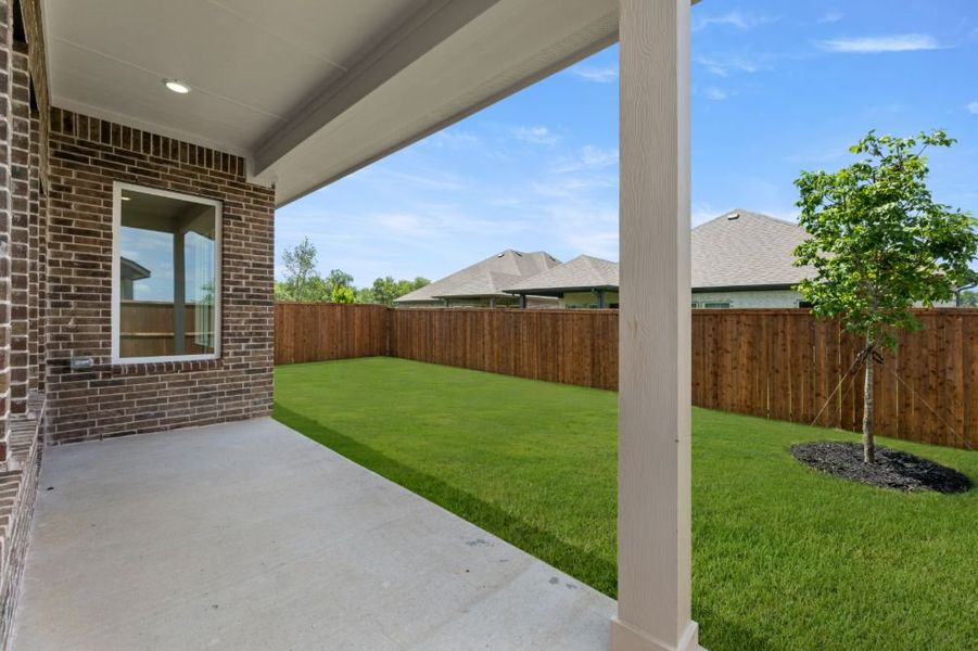 Exterior details and patio area of a home in Creekside, Royse City (Image 4).