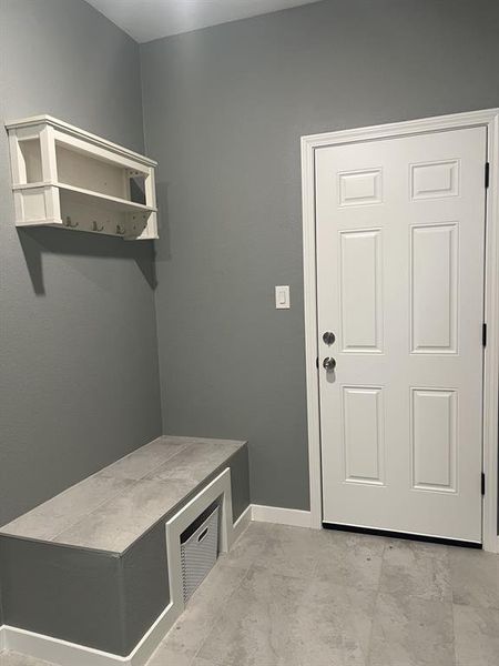 Mudroom featuring baseboards. Mudroom featuring baseboards.