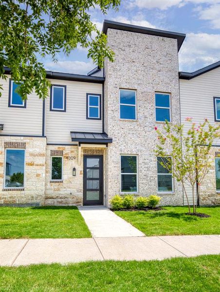 Front exterior of a new home in , Rowlett, TX, highlighting curb appeal (Image 1). Front exterior of a new home in , Rowlett, TX, highlighting curb appeal (Image 1).