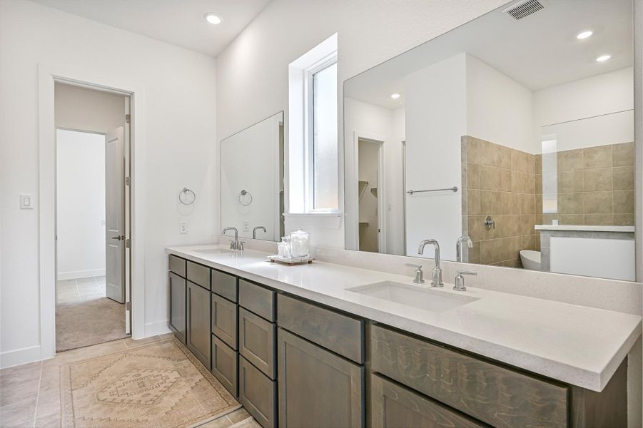 Furnished interior view inside a new home in Avalon at Friendswood 60s, Friendswood (Image 5). Furnished interior view inside a new home in Avalon at Friendswood 60s, Friendswood (Image 5).