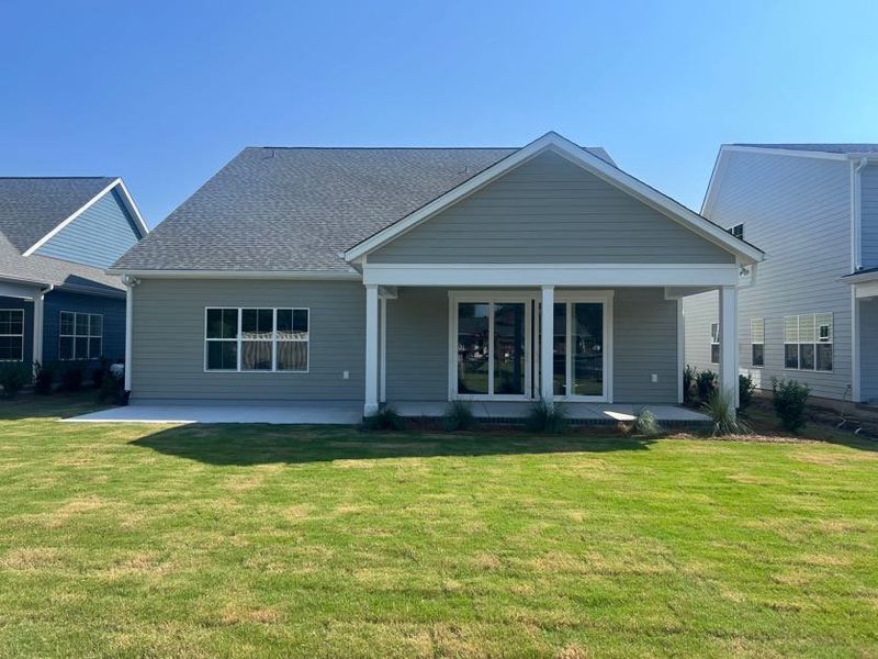 Exterior details and patio area of a home in Riverside Cove, Wilmington (Image 2). Exterior details and patio area of a home in Riverside Cove, Wilmington (Image 2).