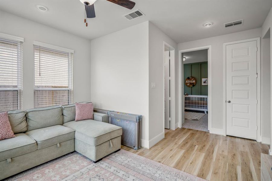 The game room or play space connects to the final seconary bedroom and bathroom.