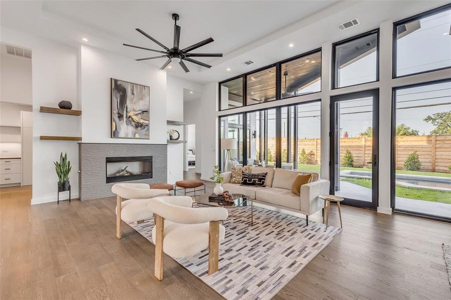 Experience the ultimate in open-concept living with this expansive great room, seamlessly connecting indoor and outdoor spaces for year-round enjoyment.