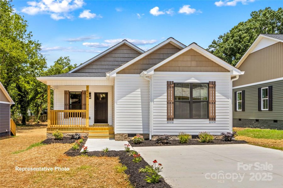 Front exterior of a new home in , Statesville, NC, highlighting curb appeal (Image 16).