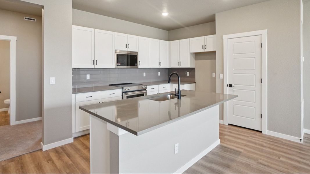Furnished interior view inside a new home in Windler Townhomes, Aurora (Image 17).
