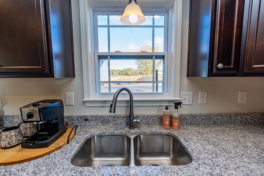 Representative furnished interior of a home built from the Clifton by Enchanted Homes in Hampshire Heights, Moore (Image 10).