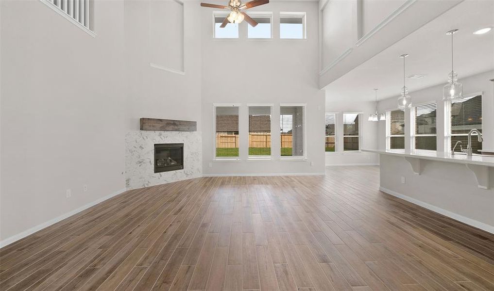 Cozy fireplace in great room (*Photo not of actual home and used for illustration purposes only.)