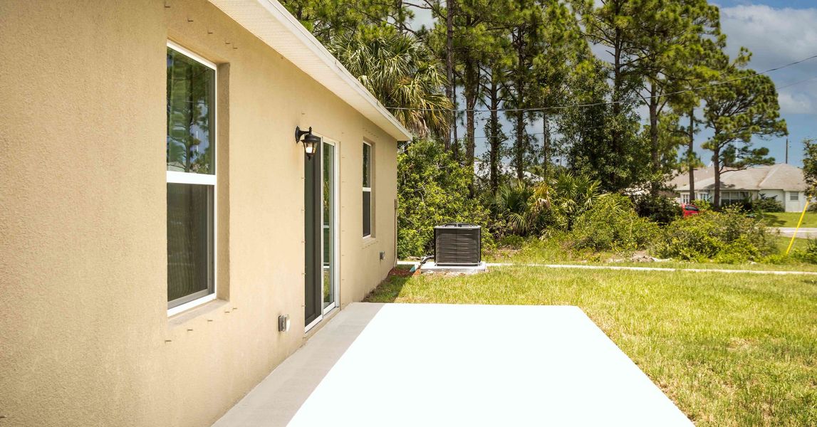 Exterior details and patio area of a home in Palm Bay, Palm Bay (Image 3).