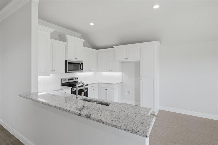 Furnished interior view inside a new home in , Tolar (Image 6).