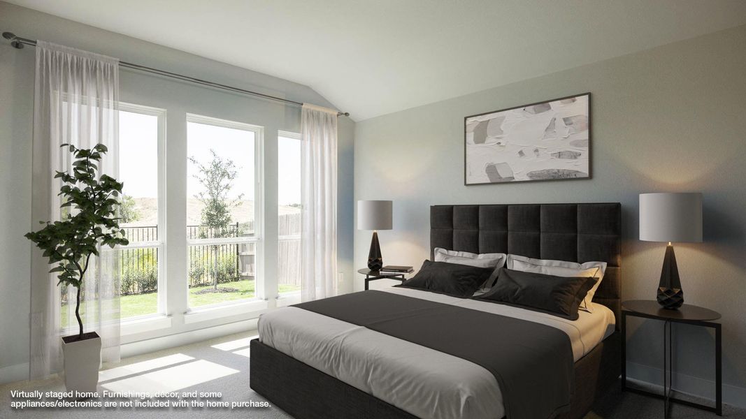 Bedroom with vaulted ceiling