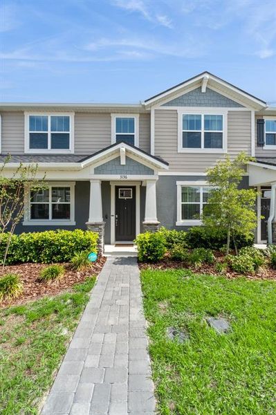 Front exterior of a new home in , Apopka, FL, highlighting curb appeal (Image 1). Front exterior of a new home in , Apopka, FL, highlighting curb appeal (Image 1).