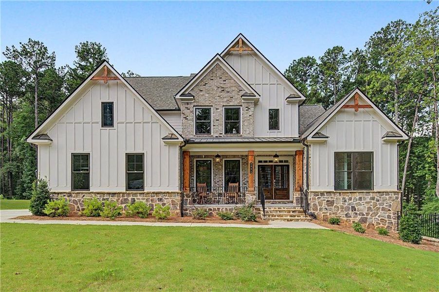 Front exterior of a new home in Ford Landing, Acworth, GA, highlighting curb appeal (Image 2). Front exterior of a new home in Ford Landing, Acworth, GA, highlighting curb appeal (Image 2).