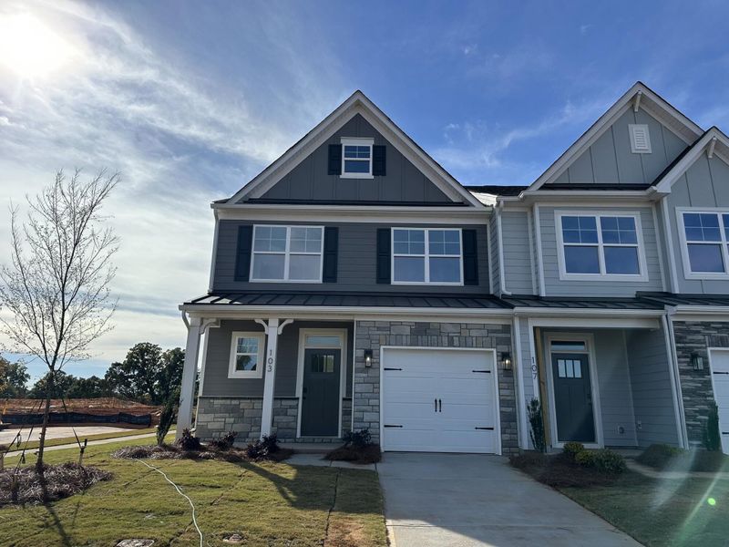 Front exterior of a new home in Blythe Mill Townhomes, Waxhaw, NC, highlighting curb appeal (Image 1). Front exterior of a new home in Blythe Mill Townhomes, Waxhaw, NC, highlighting curb appeal (Image 1).