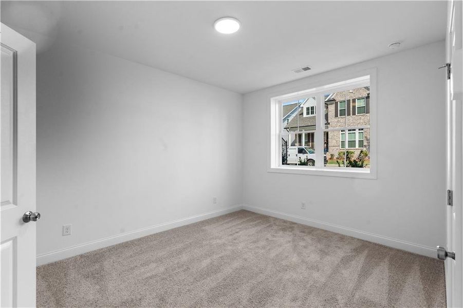 Spacious, unfurnished interior of a new home in Evanshire Townhomes, Duluth (Image 24). Spacious, unfurnished interior of a new home in Evanshire Townhomes, Duluth (Image 24).