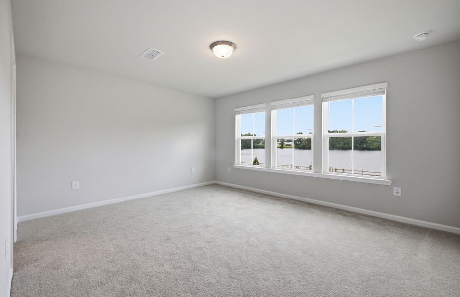 Spacious, unfurnished interior of a new home in Saunders Farm, Willow Spring (Image 29).