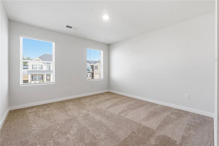 Spacious, unfurnished interior of a new home in Creekbend Overlook, South Fulton (Image 21).