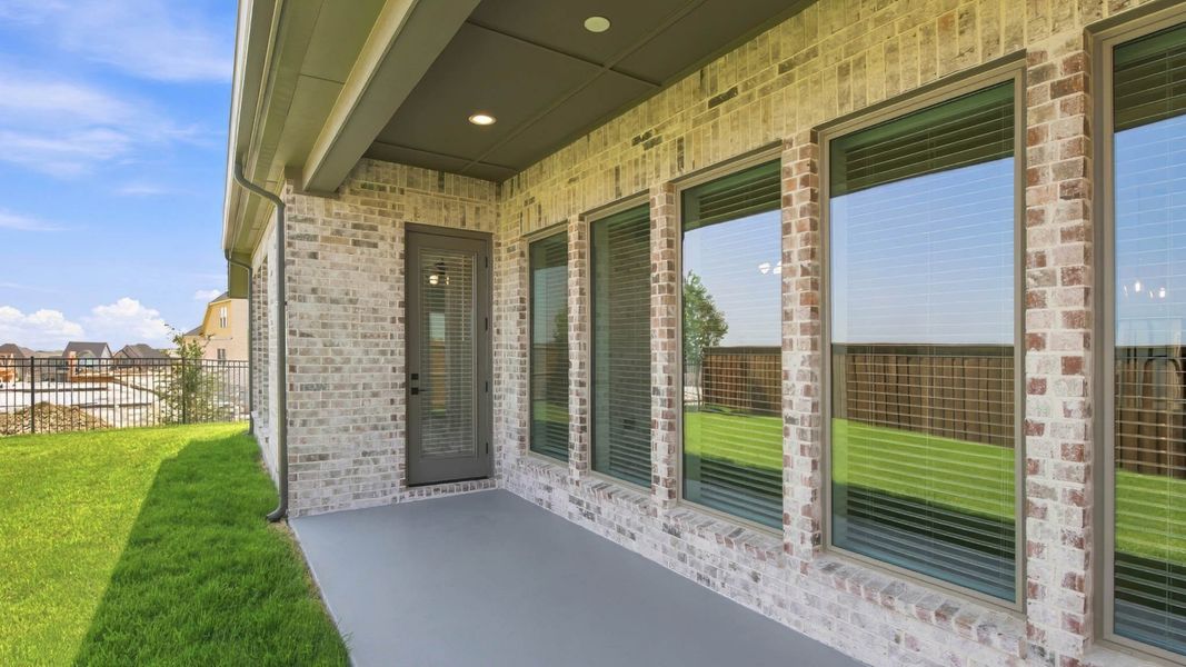 Exterior details and patio area of a home in Walsh, Fort Worth (Image 3).