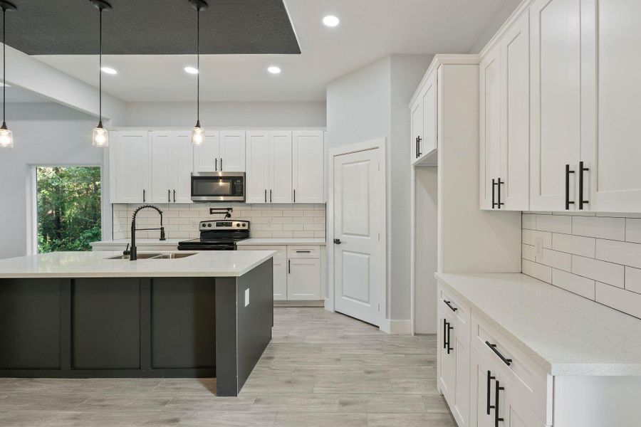 Furnished interior view inside a new home in , Willis (Image 10). Furnished interior view inside a new home in , Willis (Image 10).