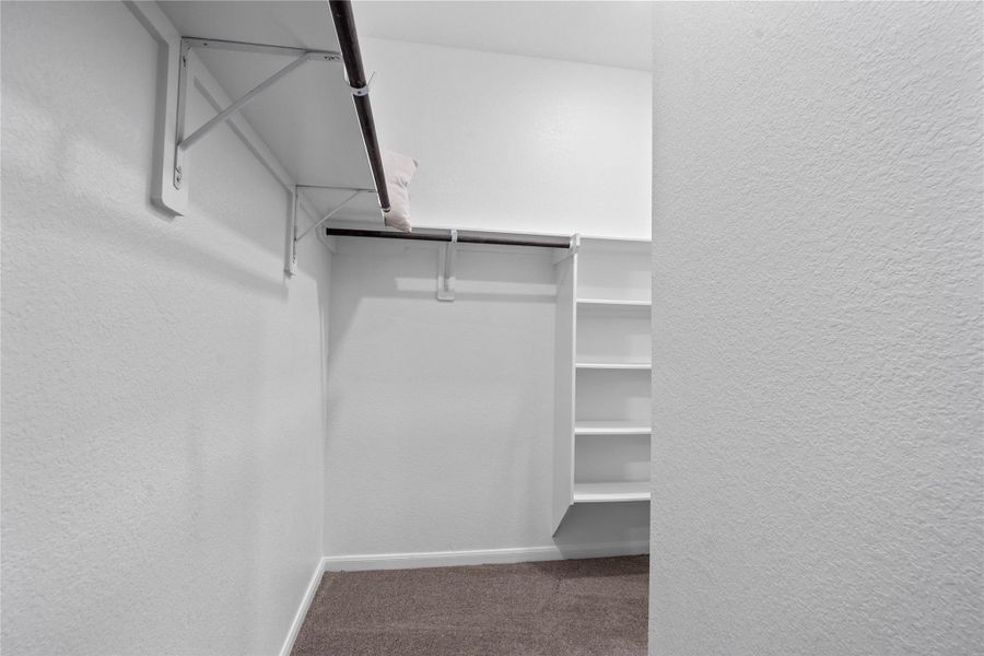 Look at this immaculate closet! With high shelving, built-in shelves, and multiple rows to hang clothing, you are sure to have enough room for all your belongings!