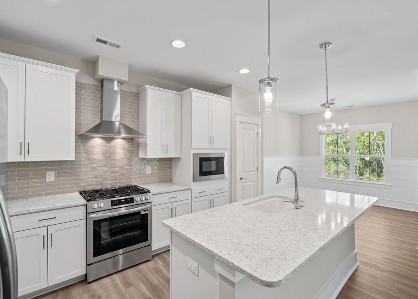 Furnished interior view inside a new home in Carolina Creek, Hampstead (Image 6). Furnished interior view inside a new home in Carolina Creek, Hampstead (Image 6).