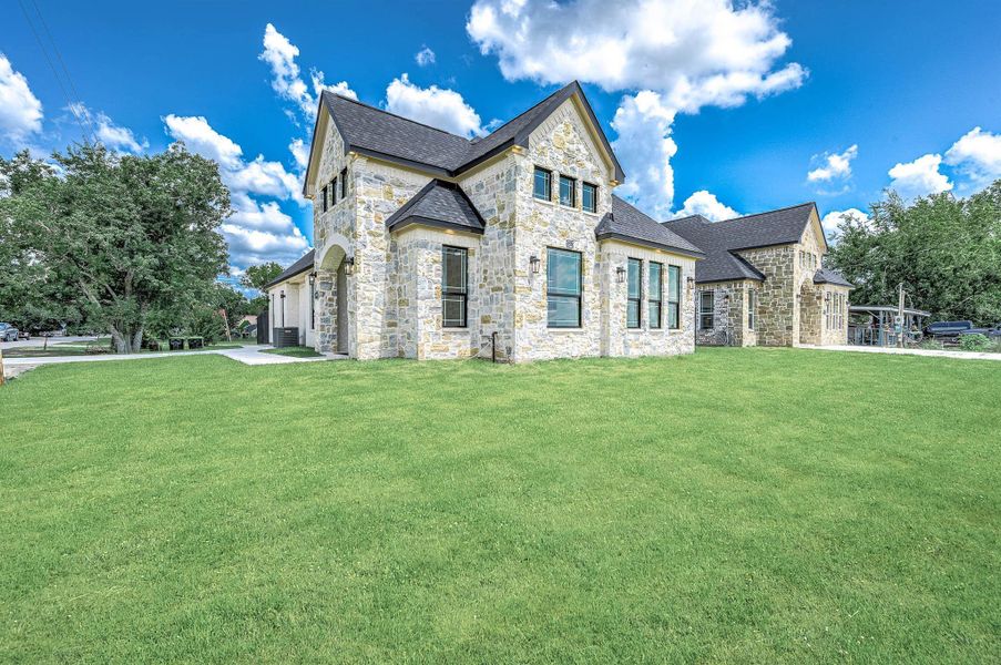 Front exterior of a new home in , Needville, TX, highlighting curb appeal (Image 25).