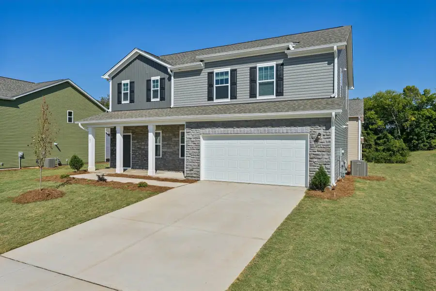 Representative exterior photo of a completed home built from the Palomar by Starlight Homes in The Meadows, Mebane, NC (Image 11).
