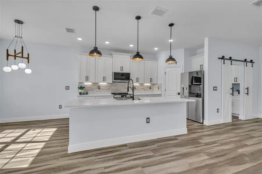 Furnished interior view inside a new home in , Poinciana (Image 8). Furnished interior view inside a new home in , Poinciana (Image 8).