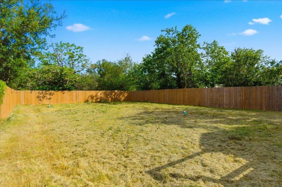 Oversized backyard with plenty of room to entertain.