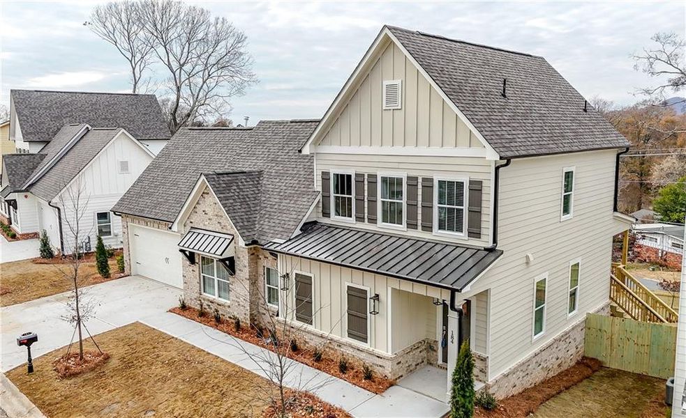 Front exterior of a new home in , Marietta, GA, highlighting curb appeal (Image 17).