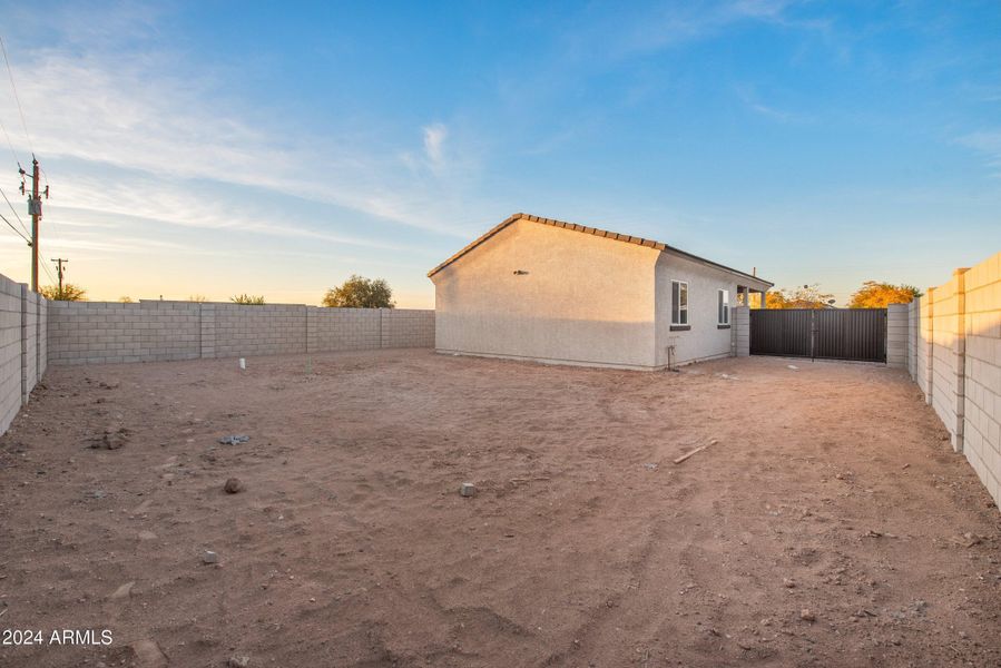 Open and fenced backyard