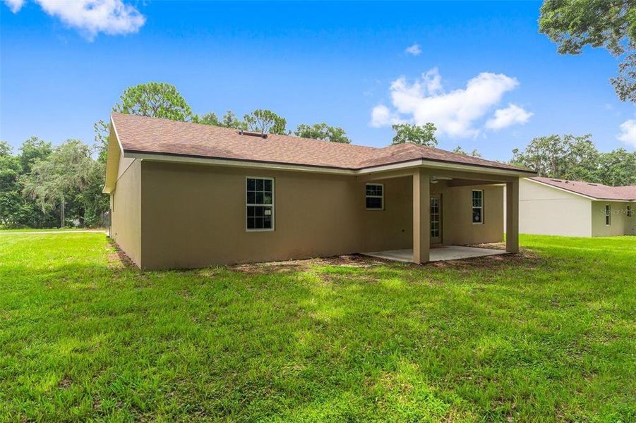 Back Exterior and Backyard Area