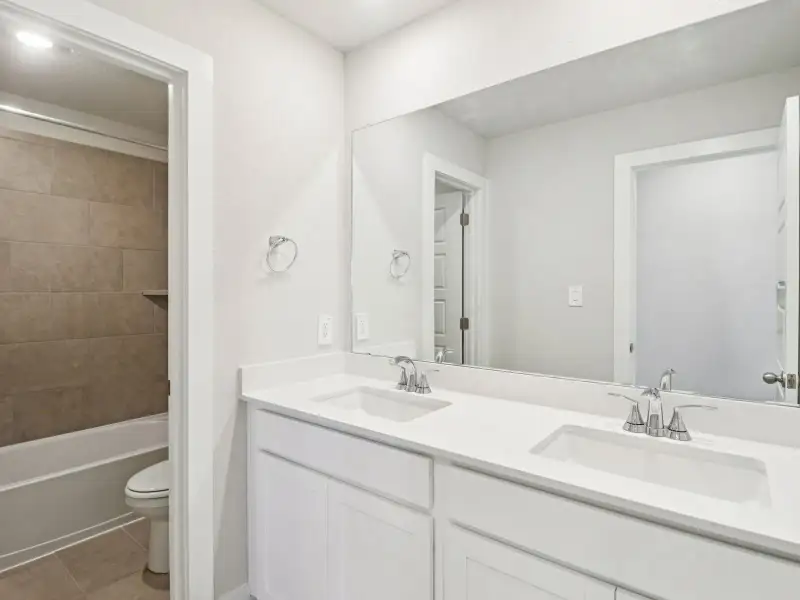 Furnished interior view inside a new home in Legendary Trails - Premier Series, Cibolo (Image 10).