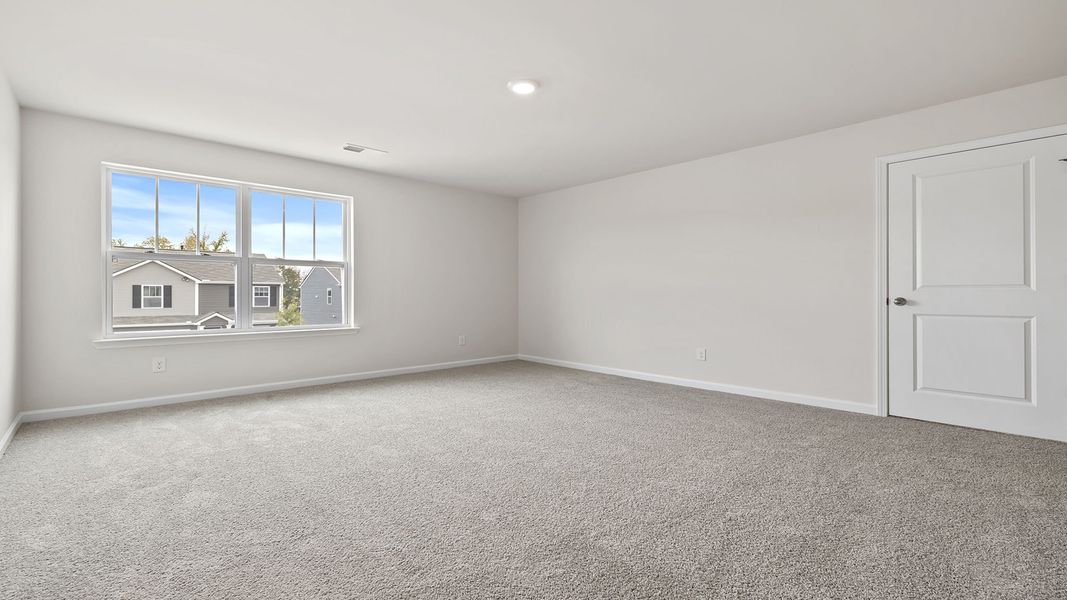 Spacious, unfurnished interior of a new home in Village Grove, Greenville (Image 24).