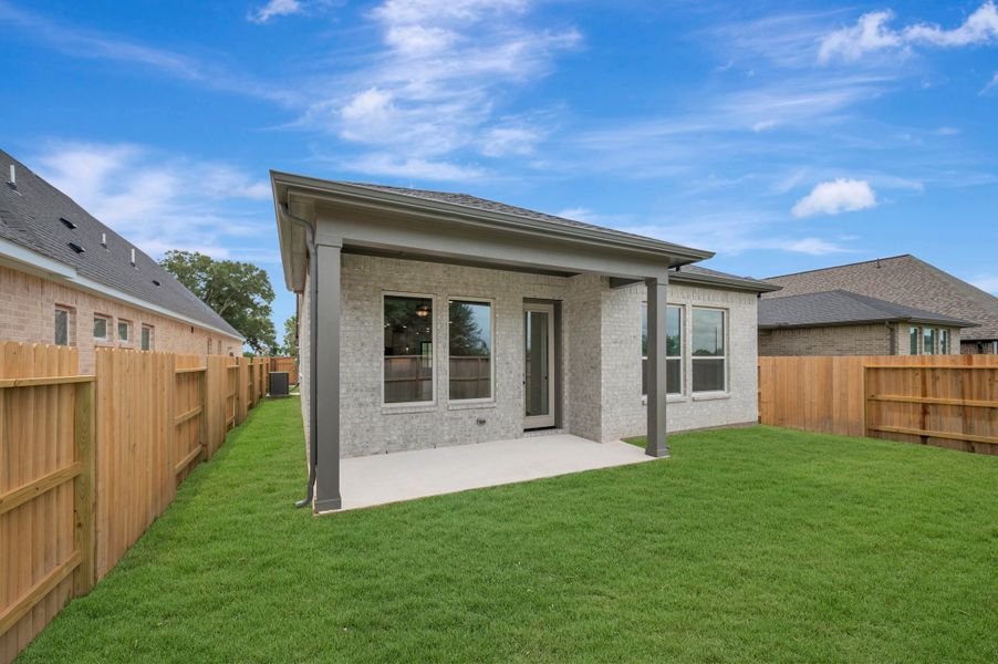 Exterior details and patio area of a home in The Grand Prairie - Meadow Collection, Hockley (Image 3). Exterior details and patio area of a home in The Grand Prairie - Meadow Collection, Hockley (Image 3).