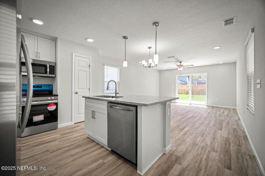 Furnished interior view inside a new home in , Jacksonville (Image 6). Furnished interior view inside a new home in , Jacksonville (Image 6).