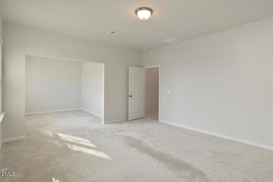 Primary bedroom with sitting room