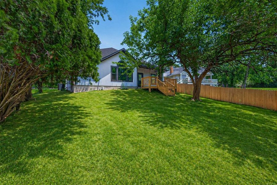 Oversized backyard offering space, privacy, and endless possibilities for outdoor living.