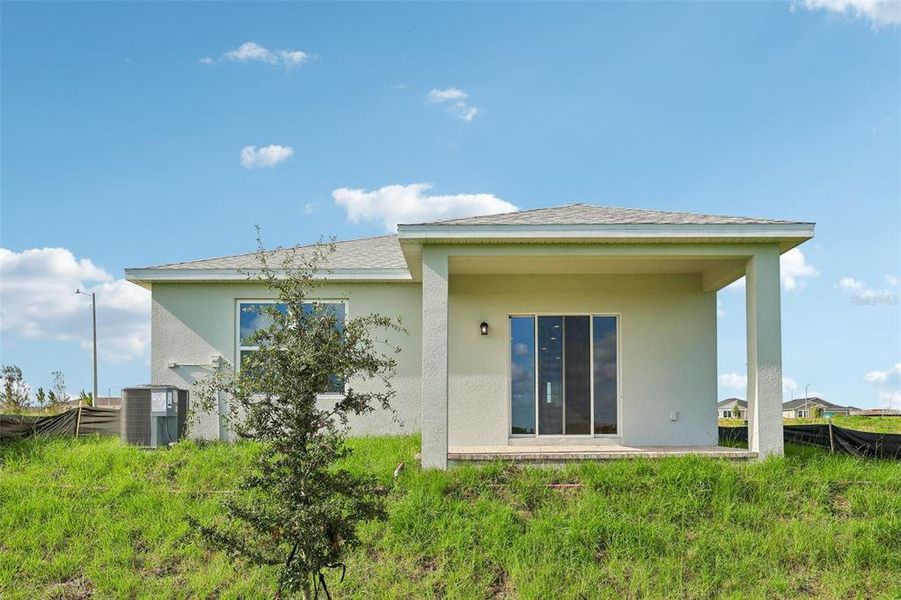 Exterior details and patio area of a home in Hamilton Bluff, Haines City (Image 24).